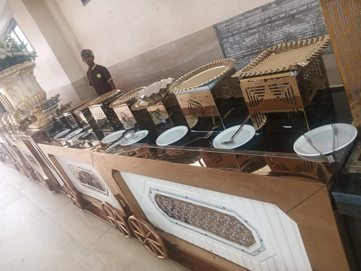 Buffet counter with hot boxes and stacked plates