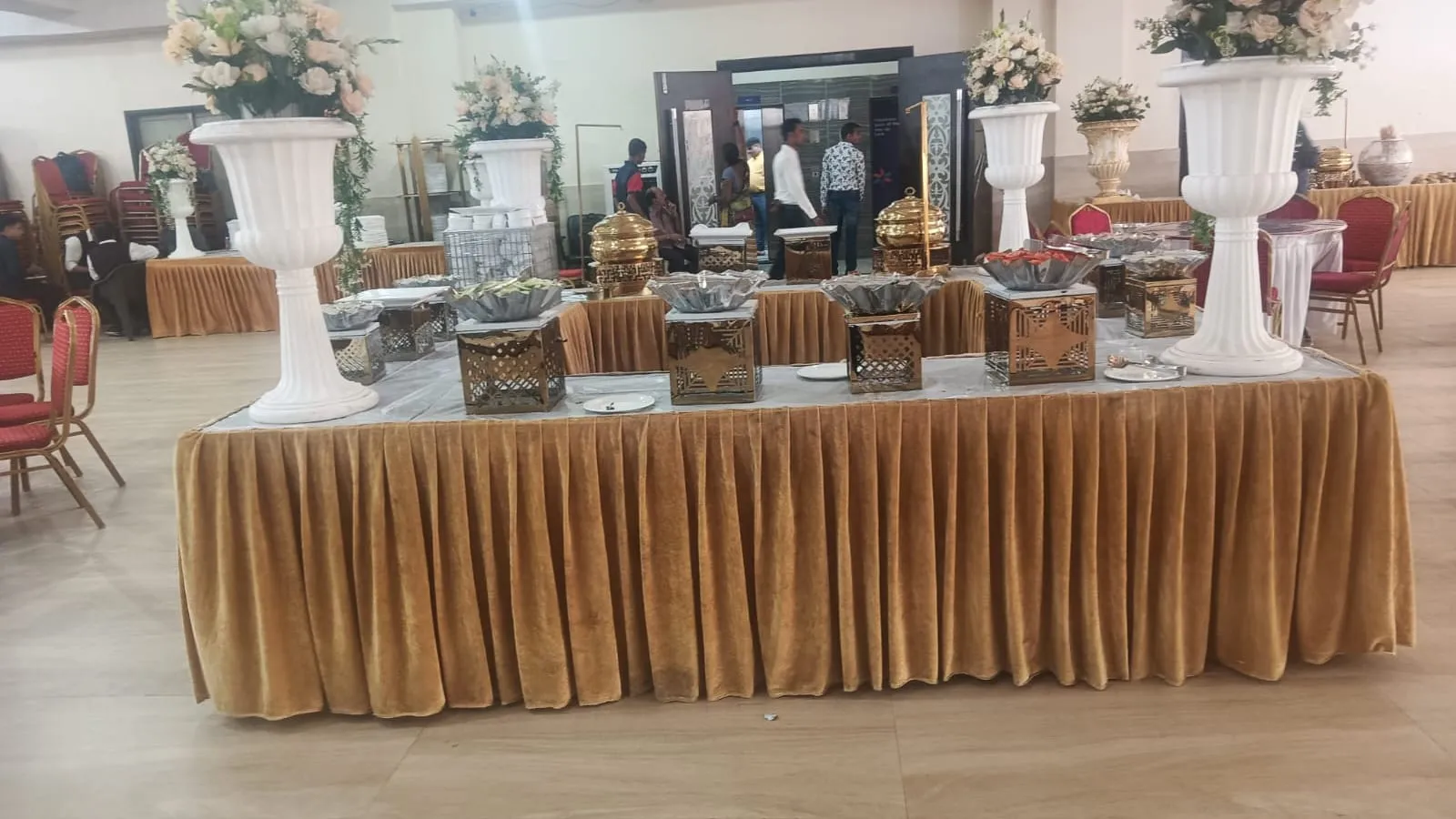 Pure vegetarian Indian thali spread laid out on brass serveware