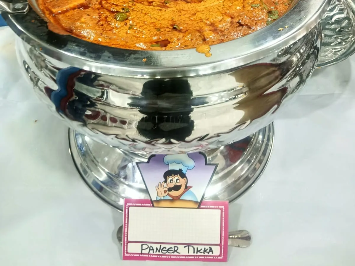 Paneer tikka in a labelled chafing dish