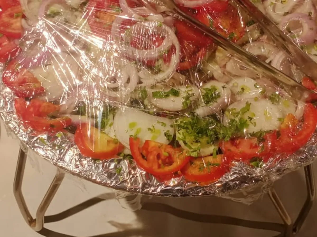 Salad platter with onion, tomato and cucumber