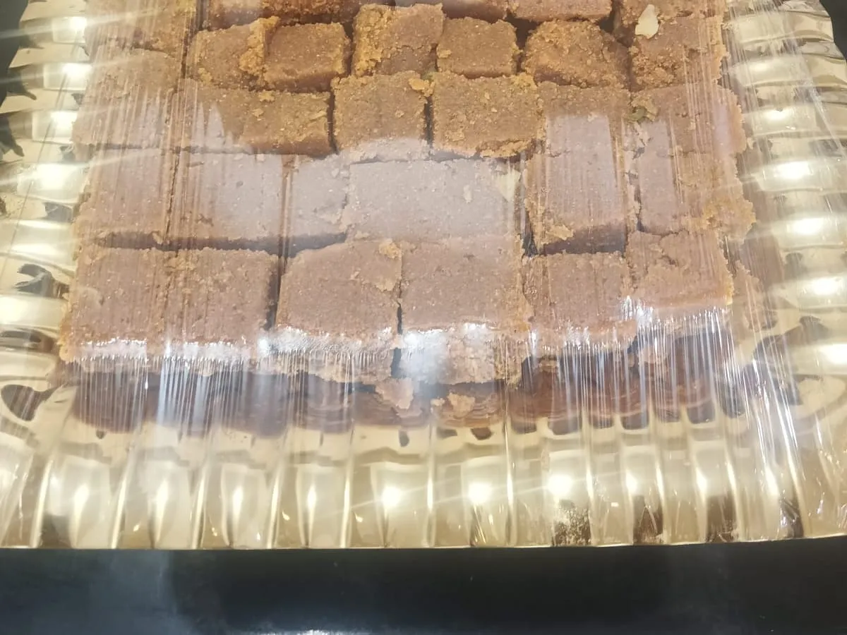 Tray of barfi sweets prepared for a function